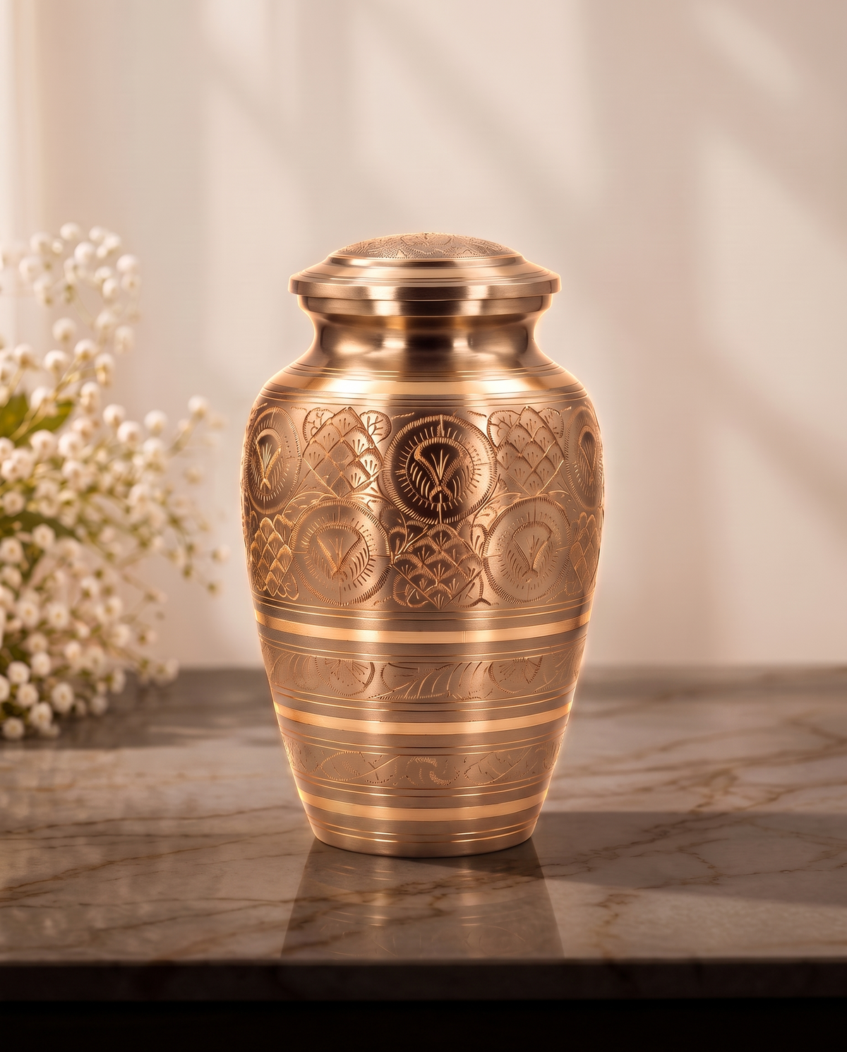 The hand-etched brass urn